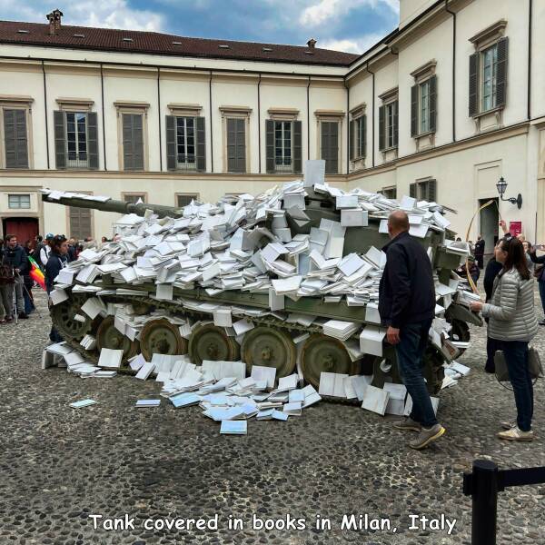 random pics - royal palace of milan - # Tank covered in books in Milan, Italy