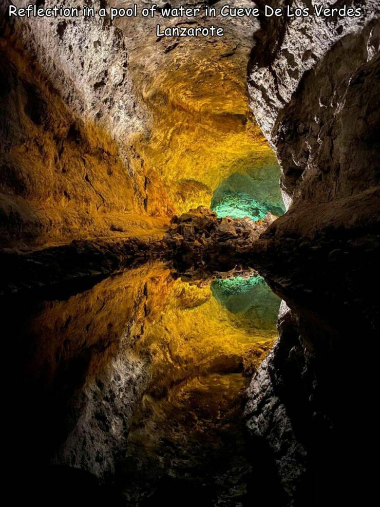 random pics- cueva de los verdes - Reflection in a pool of water in Cueve De Los Verdes Lanzarote