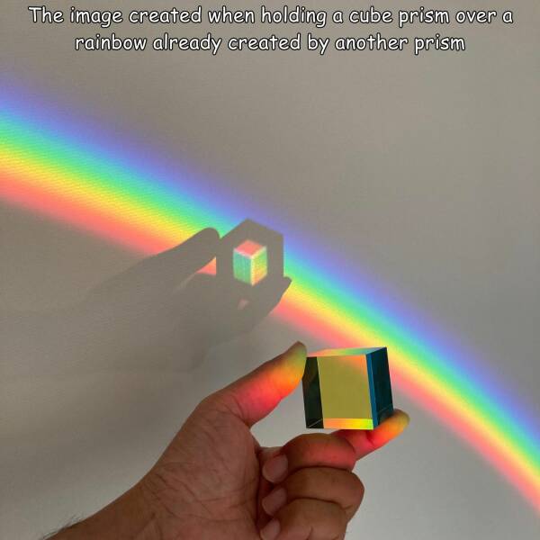 cool and interesting photos - prism rainbow on wall - The image created when holding a cube prism over a rainbow already created by another prism