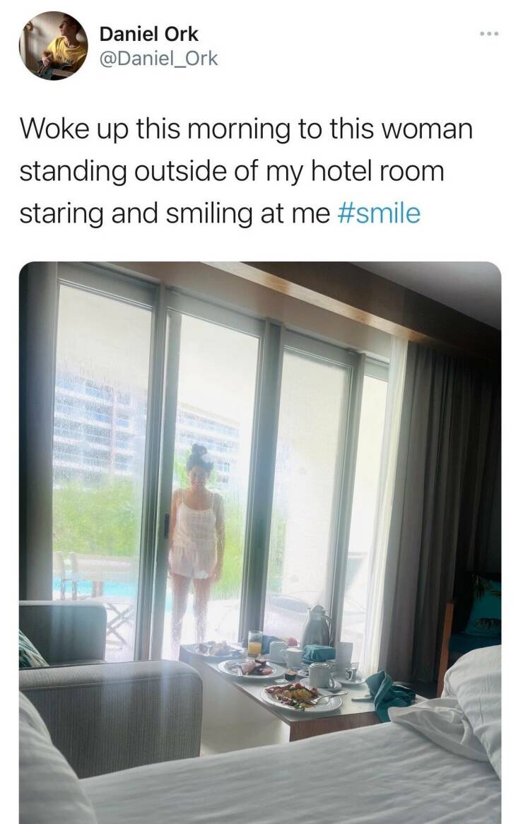daily dose of randoms -  curtain - Daniel Ork Woke up this morning to this woman standing outside of my hotel room staring and smiling at me