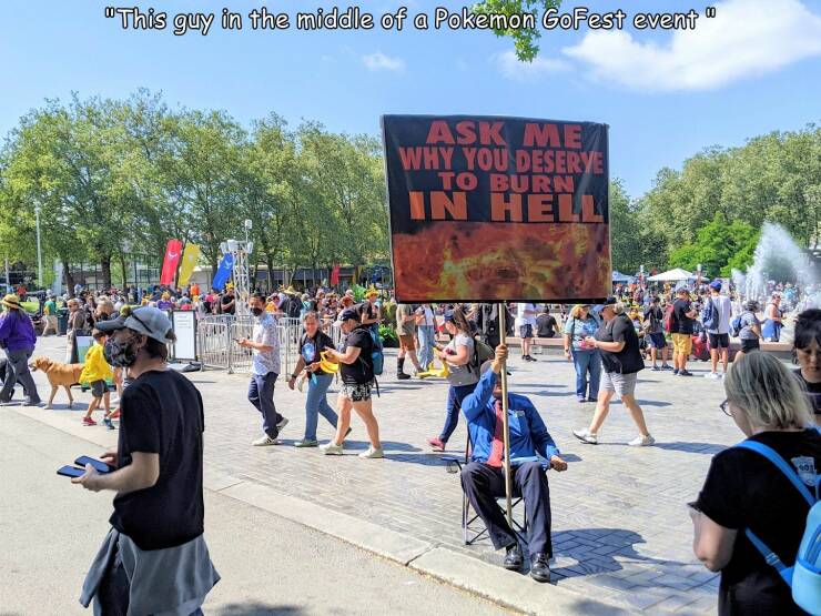 crowd - "This guy in the middle of a Pokemon GoFest event Ask Me Why You Deserve To Burn In Hell