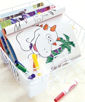 Use a dish-drying rack to organize a child's art center. Stack books or blank paper between the prongs. Store markers, crayons, and pencils in the utensil caddy.