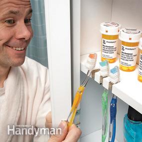 Carve a few nooks into your medicine cabinet shelf and you have hidden storage for your tooth brushes.