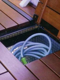 Add a wire basket under you deck for additional outdoor storage space. What a great way to hide garden hoses, outdoor dog toys, or sport equipment.