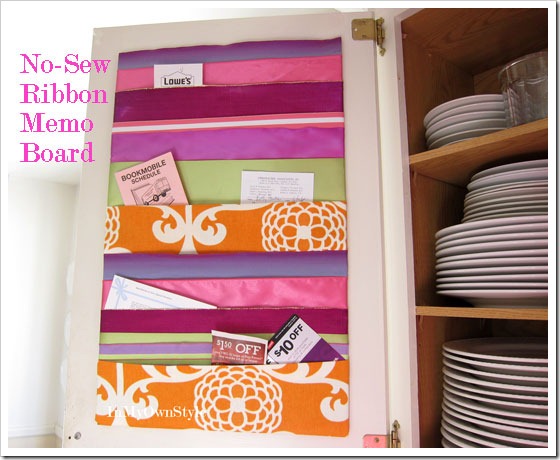 Keep coupons and receipt organized with a ribbon memo board. Use duct tape to attach the ribbon to some foam board then hang it inside a cabinet.