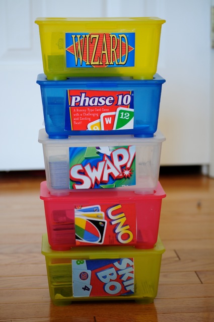 Recycle baby wipe cases to store game pieces. So much better than using the bulky boxes that the games originally come in. You could also spray paint them to match your decor.