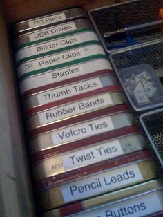Organize all of those little items with labeled Altoids tins.