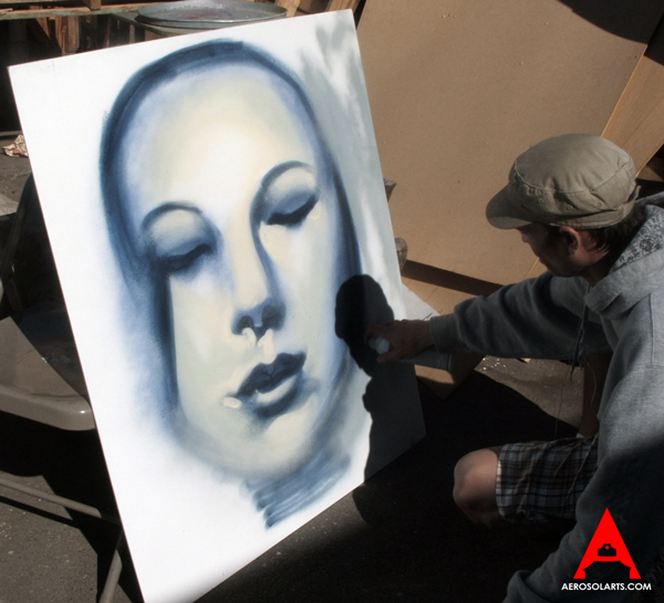 Aerosol Artist Caleb Aero in the zone while painting a custom canvas piece.http://www.aerosolarts.com

