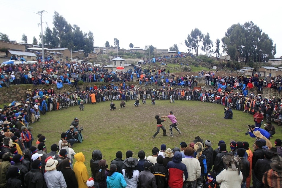 Andean men participate in a one-on-one fight