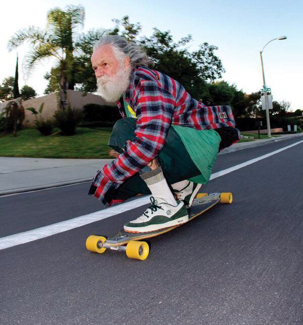 old man skateboarding