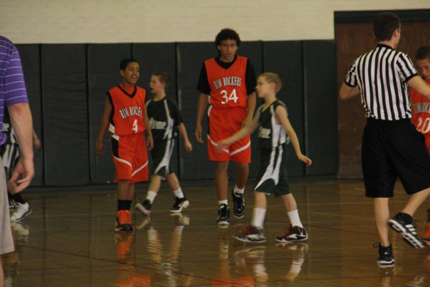 This is my little brother he just turned 12 and hes 6 foot and wears a size 15 shoe!! LOOK HOW BIG HE LOOKS NEXT TO THE OTHER PLAYERS!!!