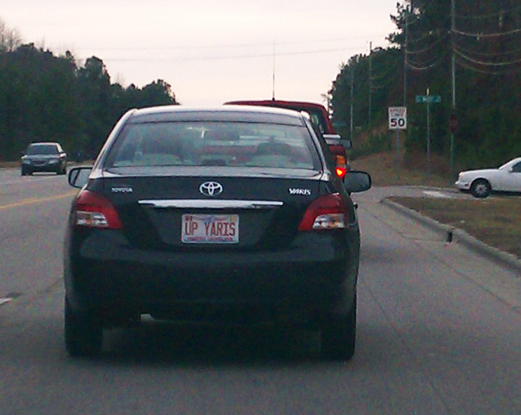 "Up Yaris" plate on a toyota yaris. Apex, NC. 