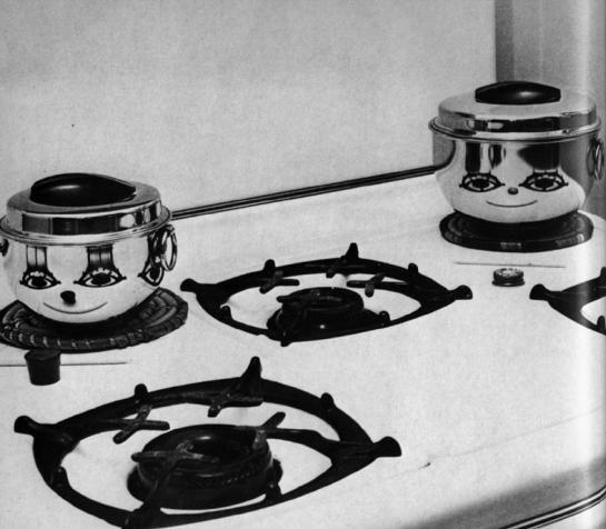 This picture is not photoshopped, nor are the faces on the pots painted on. They are actually angled to the point where the reflection of the stove top is reflected into the shape of a smiley face.