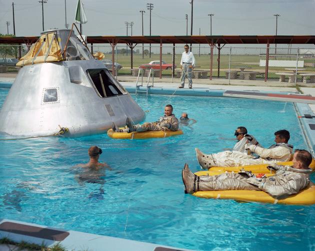 The crew of Apollo 1 rehearsing their water landing in 1966.Sadly, all three astronauts were killed on the launch pad in a fire.