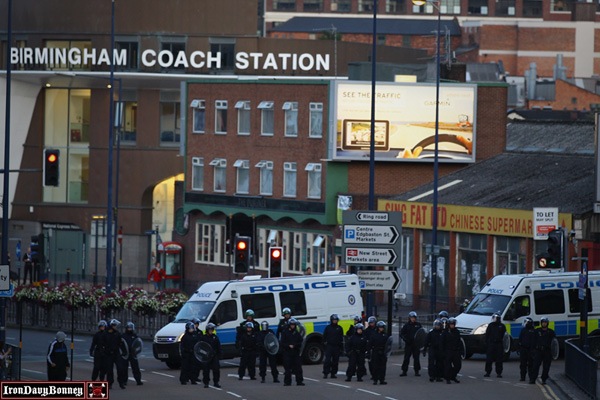 Birmingham Police Response - Police disperse youths during riots in Birmingham City Centre.