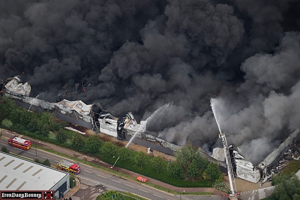 Sony Distribution Center #2 - An aerial view of the Sony distribution center engulfed in fire.
