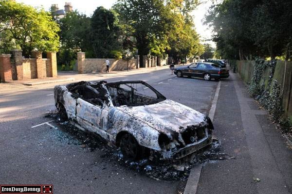 Clean Up Across London After A Third Night Of Rioting #1 - Burnt out cars are left in Ealing Green following a night of rioting.
