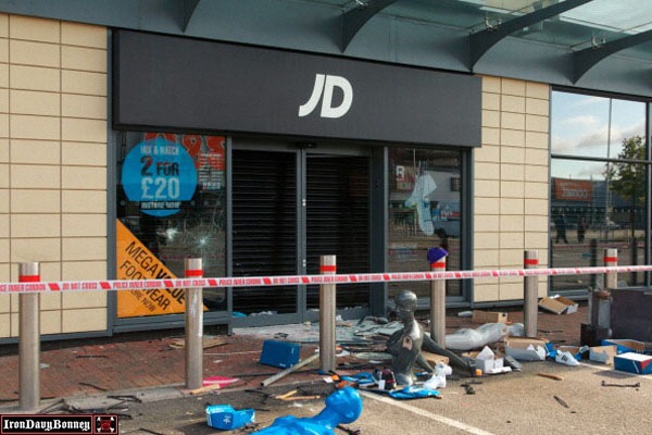 Shops Looted During Riots - A view of sports reatiler JD Sports shows the damage from violence not seen in North London since 1985.