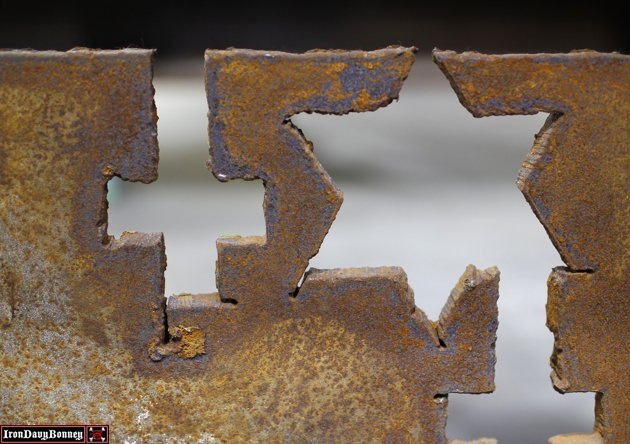 Steel recovered from the World Trade Center that has been cut to make memorial crosses and stars