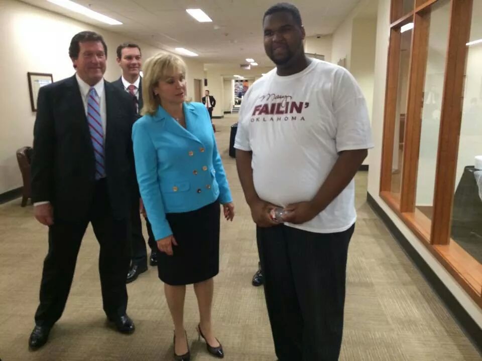 Republitard thinks she found a black man supporting her so she wanted a picture with him. She didn't read the t-shirt till after. This is her sorrowful sad ass face. How loud can you laugh?