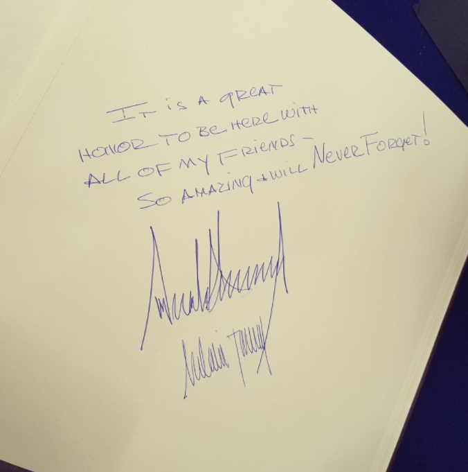 They asked him to sign the guestbook. He must have heard "yearbook." Or maybe he just can't read and write real good, because he's stupid. Regardless, this is what he wrote.