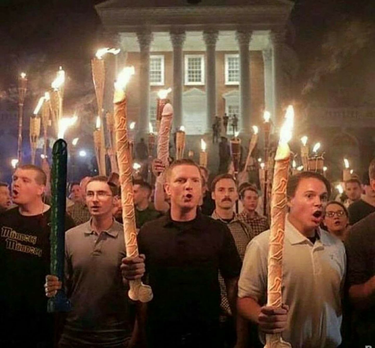 Nazis, alt-right, 3%'ers and white supremacists carry torches as they march through the University of Virginia campus in Charlottesville.