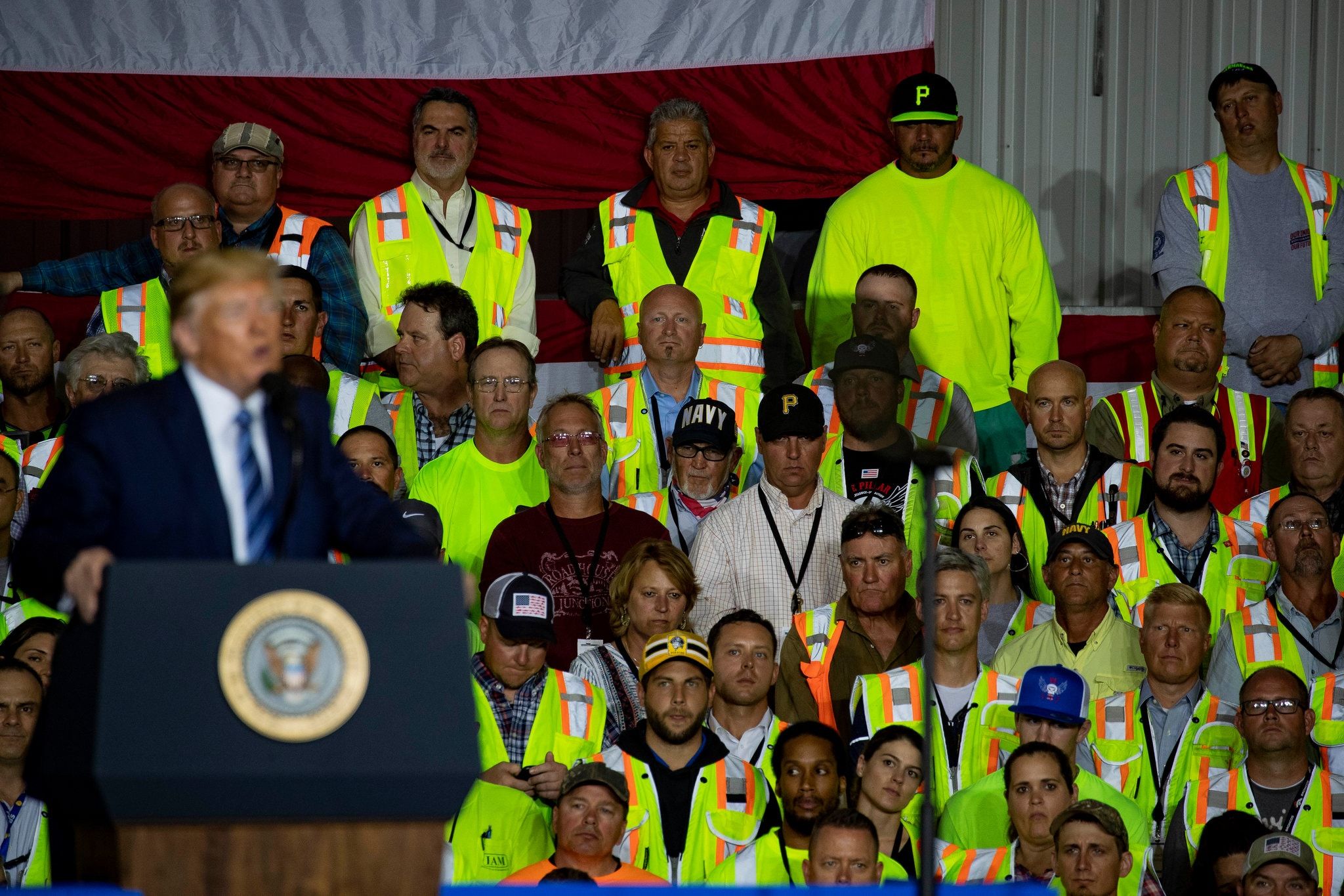 Thousands of RD Shell petro union workers were forced to attend Drumpf's speech. They were told "Your attendance is not mandatory," but the rules said that only those who arrived at 7 a.m., had their work IDs scanned and then stood waiting for Dotard for hours would get paid for the time. "NO SCAN, NO PAY!" Dicktators do what Dicktators do.