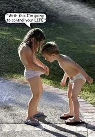 Very funny picture of a little girl and boy!