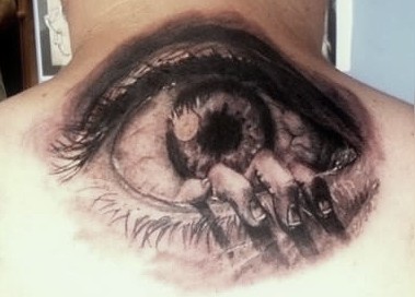 scary eye tattoo on-back