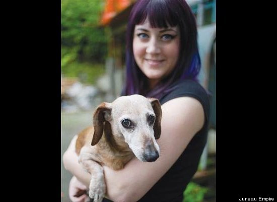 Protective pet-owner Brooke Collins punched a bear in the snout that had her dachshund Fudge clenched in its jaws