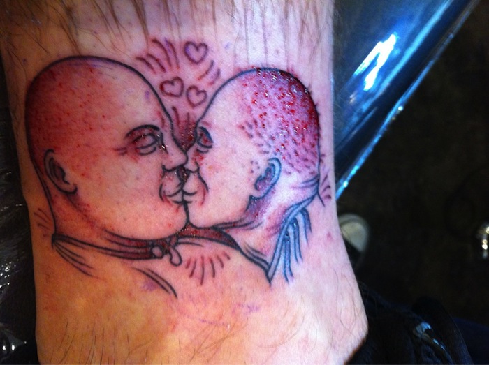 He promised to pay one thousand dollars to anyone who gets a tattoo of Charles Barkley kissing referee Dick Bavetta. Emmet Bentley did it, here's the pic. 