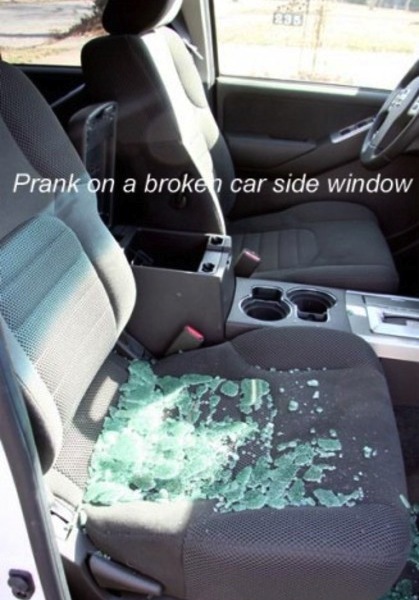 Roll down window, throw broken glass on passenger seat, get punched in the face.