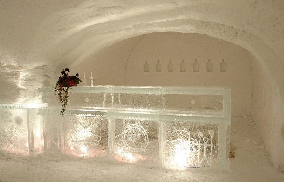 Guests at Finland's Snow Village can belly up to the IceBar for a drink