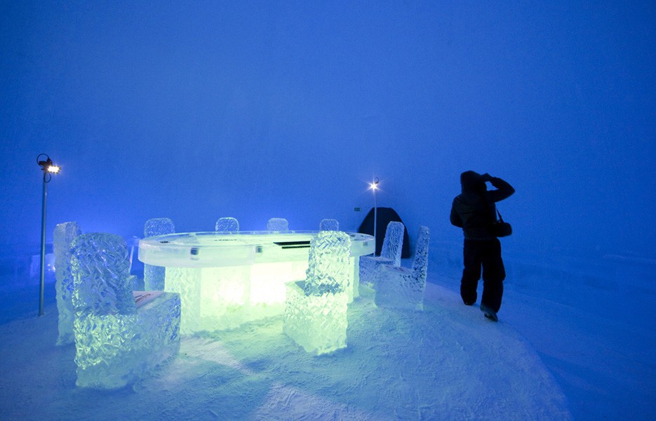 A dining -- or drinking -- table is illuminated in Finland's Snow Village.