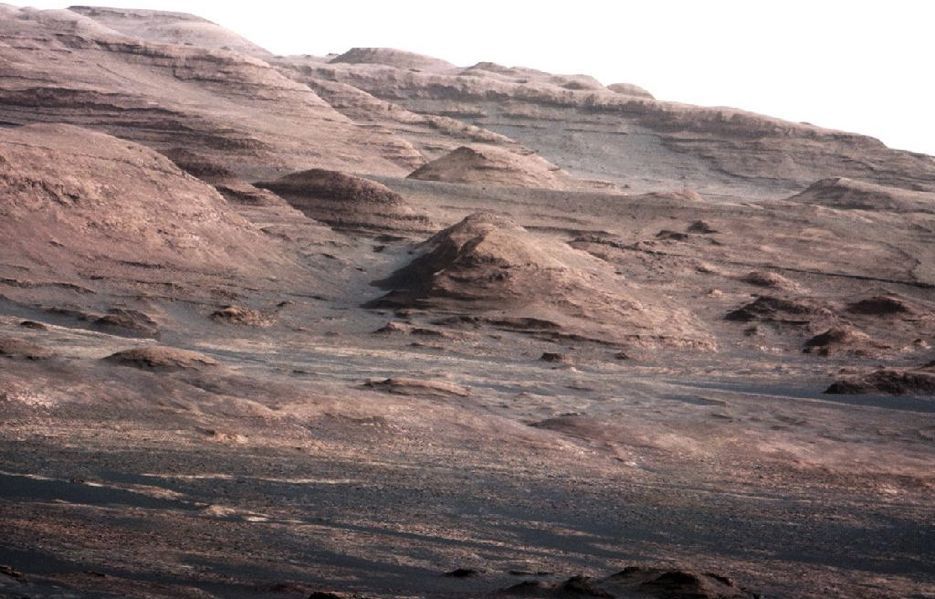 On Aug. 27, NASA released a high-resolution shot of the dark dunes and layered rock at the base of Mars' Mount Sharp, Curiosity's eventual destination. T