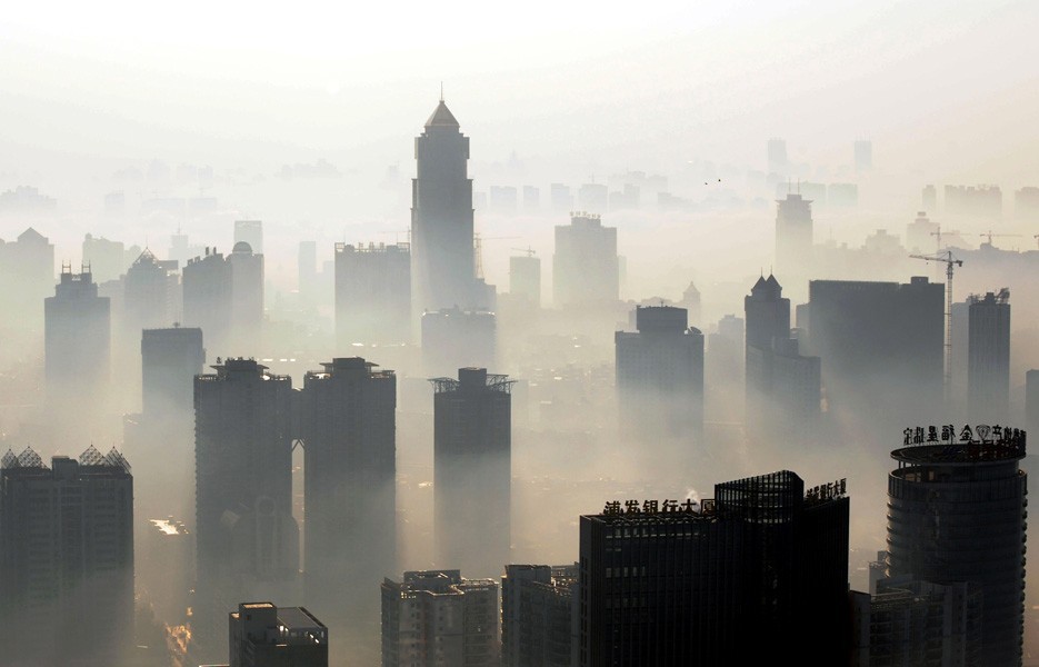 Buildings stand out amid haze engulfing Wuhan, central China's Hubei province.