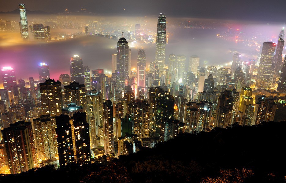A layer of fog floats into Victoria Harbour in Hong Kong.