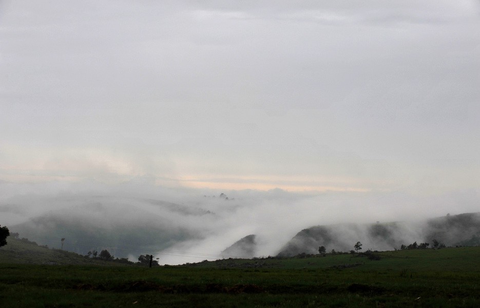 The landscape of Umtata in South Africa's Eastern Cape is covered in fog.