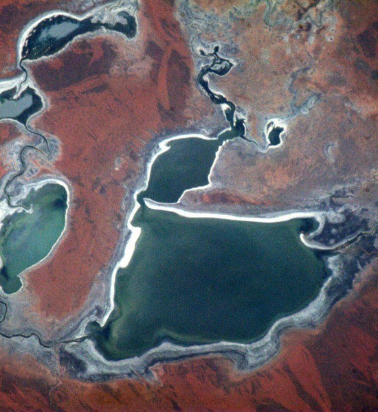 "Australia - the dryness creates colours and textures that make the Outback immediately recognizable from space."