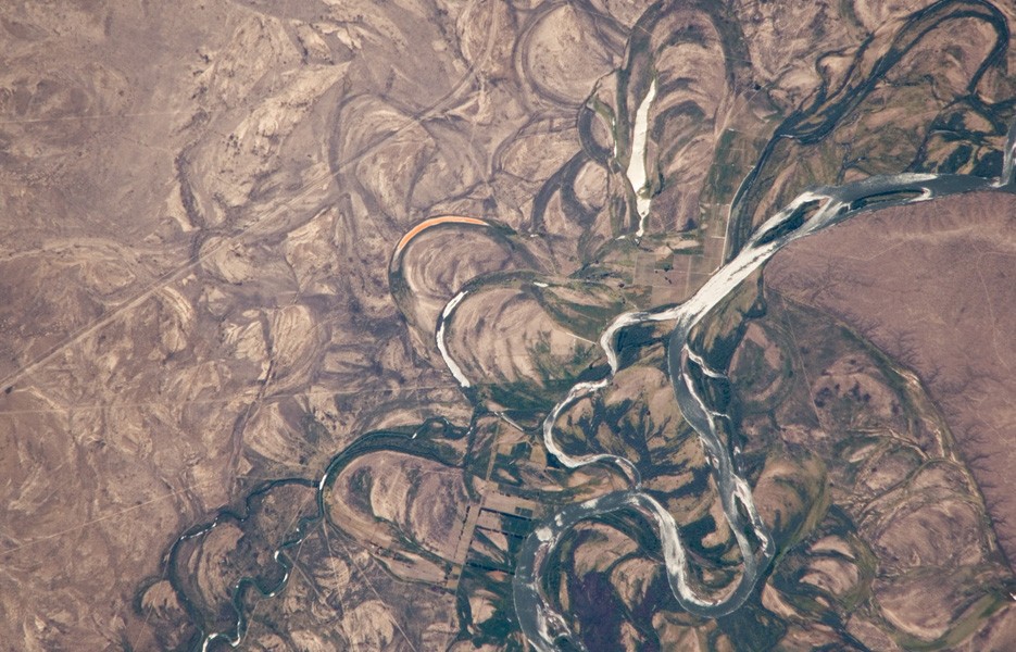 The Rio Negro in South America flows southeast from the Andes Mountains to the Atlantic Ocean.