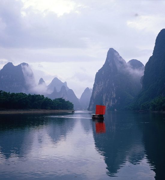 Li River and surrounding hills seen from a boat on the Li near Yangshuo, China.