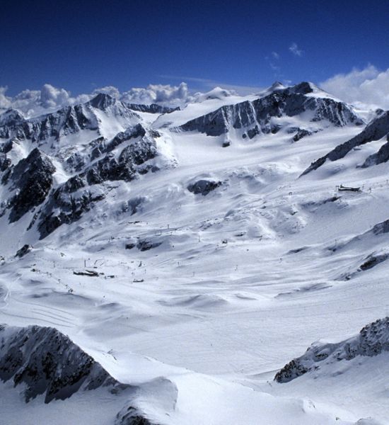 Alpine peaks and Stubai Glacier from the Stubai Glacier Platform, Austria.