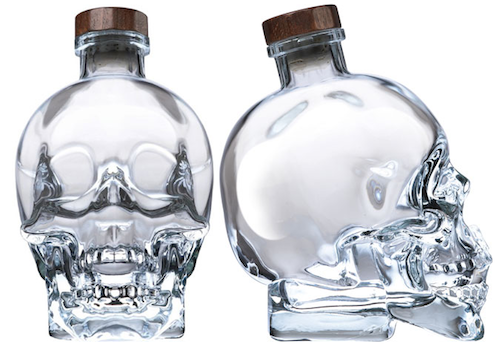 Guy Artistically Changes Skull Liquor Bottle Into Creepy Face