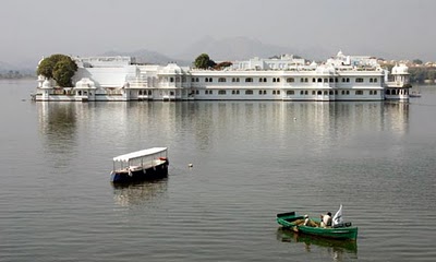 Lake Palace Udaipur, India. The ornate palace sits on a 4-acre slab of land in the middle of Lake Pichola. Its exterior is made from white marble, which architect Peter Koliopoulos says isnt exactly compatible with the natural surroundings. You always want to develop design concepts that leverage, reinforce and highlight the natural features of the area. The scale and form of this building, though, are pretty obtuse, he says. Incorporating the marble just extends the oddity of the design approach."
