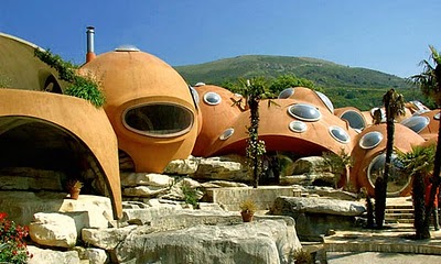 Bubble Castle Theoule, France.  There are no sharp angles or straight lines in this unusual design. Lovag unified the home with its natural surrounding by bringing outdoor elements inside, including palm trees and a waterfall. This home is incorporating these outdoor rock croppings in a way that links them to the overall bubble concept, architect Peter Koliopoulos says. The house has already been deemed a historic monument by Frances Ministry of Culture, despite the fact that its not even 50 years old.