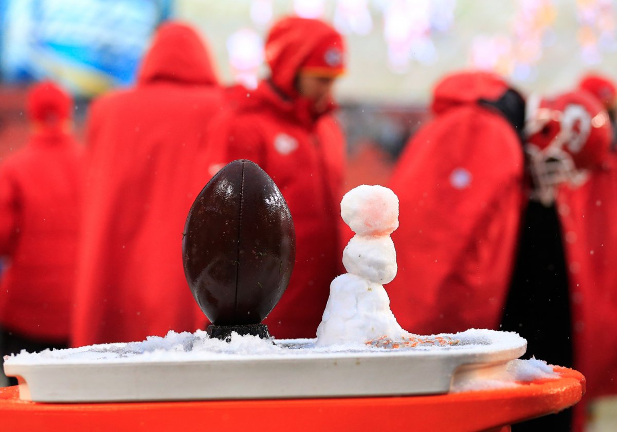The Chiefs make a football-sized snowman.