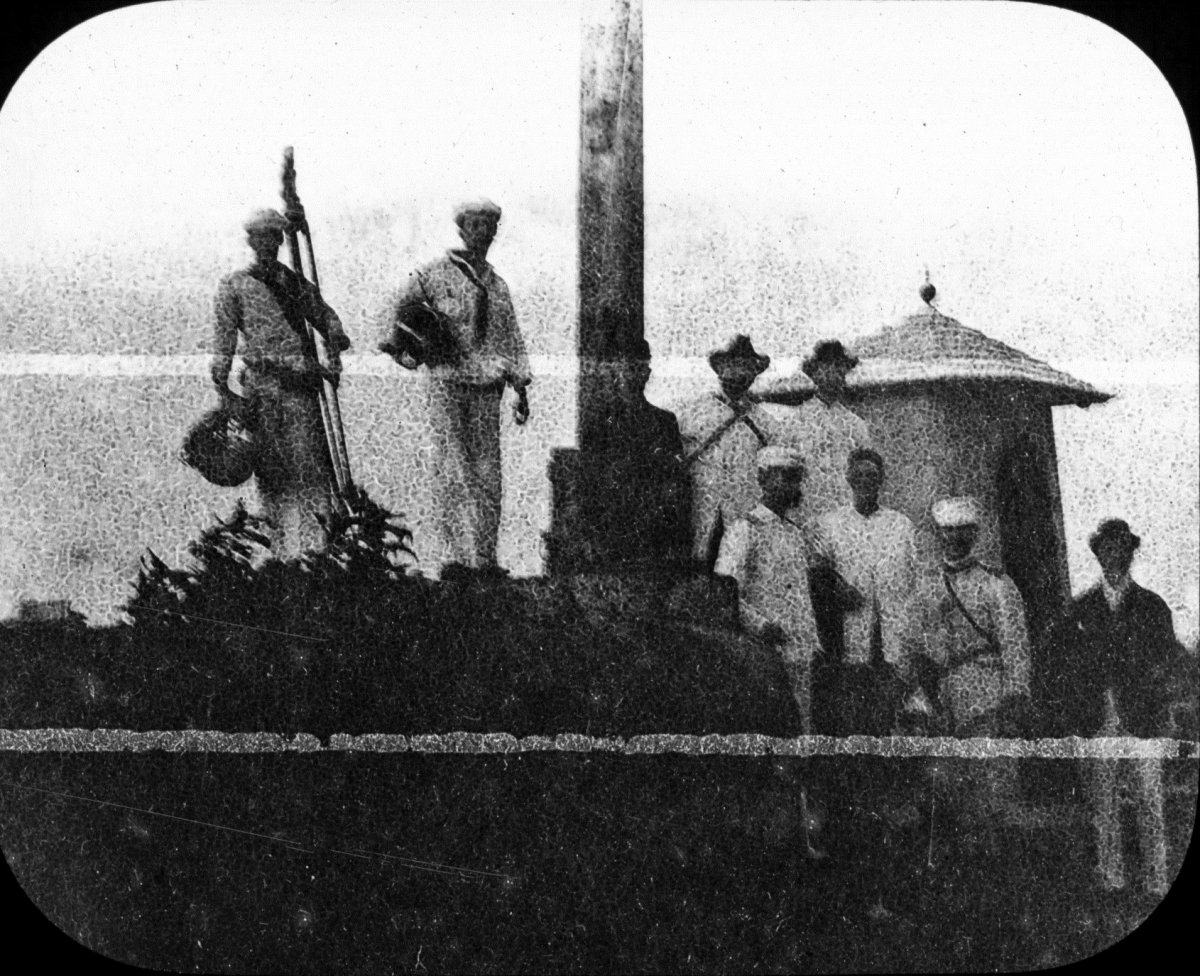 After the battle, U.S. sailors raised the American flag over Manila.