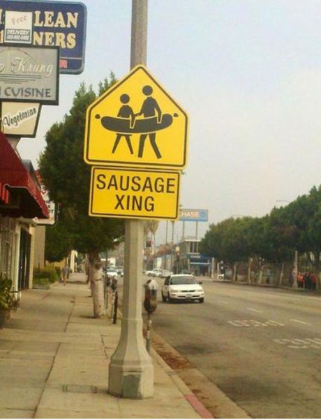 street sign - Lean 1NNERS htung Cvisine Vegetarios Sausage Xing