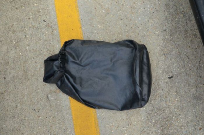 I wonder what's inside of this black bag.