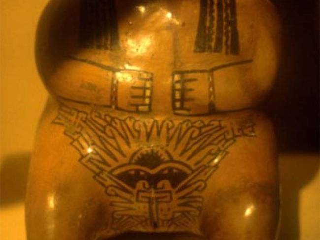 This figurine from the Nazca Region of Peru indicates that women were given these fertility designs in their delicate areas.